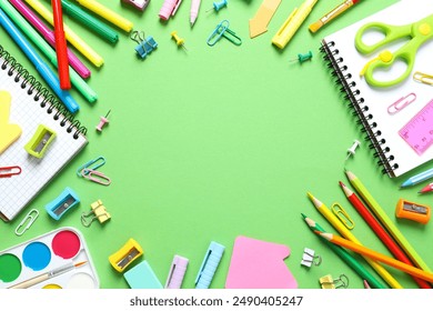 Flat lay with school stationery on color background, top view - Powered by Shutterstock