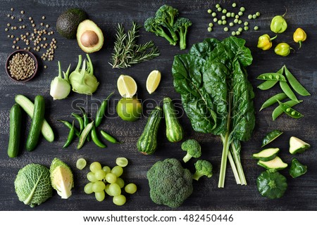 Flat lay series of assorted green toned vegetables, fresh organic raw produce