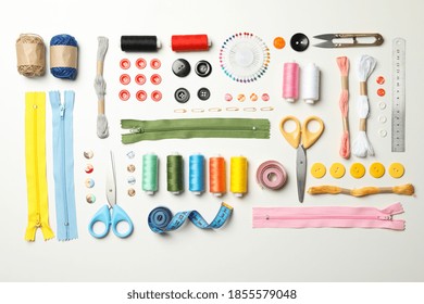 Flat lay with sewing supplies on white background - Powered by Shutterstock