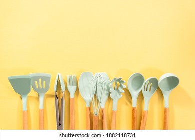 Flat Lay. Silicone Cooking Utensils With Wooden Handle.