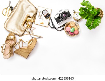 Flat lay for social media fashion bloggers. Feminine accessories, bag, shoes, vintage no name photo camera on white background