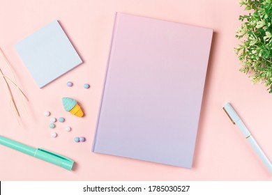 Flat Lay Stationery On Work Desk In Pink Pastel Background