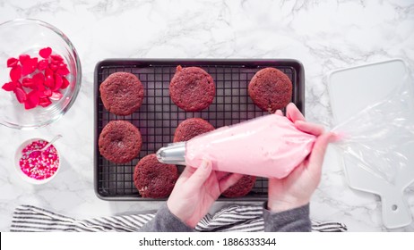 Flat Lay. Step By Step. Piping Italian Buttercream Frosting On Top Of Red Velvet Cupcakes.