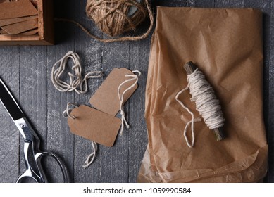 Flat Lay Still Life Of Plain Paper And Gift Wrapping Supplies.