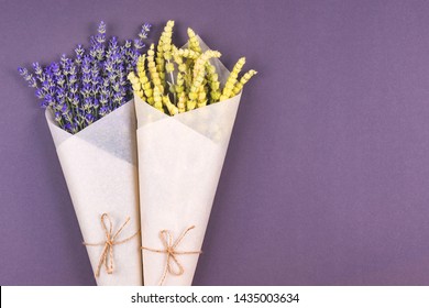 Flat Lay Style Composition Of Lemongrass And Lavender Herbs  Flower Wrapped Into Craft Paper On Colorful  Background.