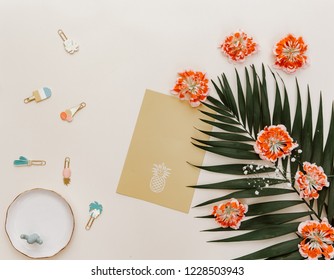 Flat lay Stylish minimal composition with blank colour paper and green leaves on a pink pastel background. Artwork mockup with copy space
