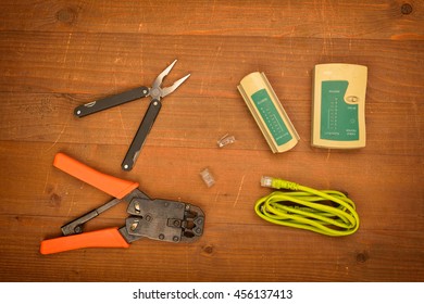 Flat lay with tools for crimping with component to computer network