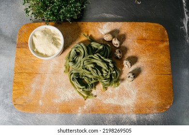 Flat lay top view fettuccine pasta. Nest-shaped noodles close-up: fettuccine, ramen, soba, rice noodle, egg noodle, green noodle - Powered by Shutterstock