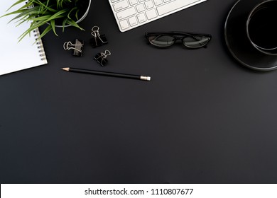 Flat Lay Of Top View Modern Black Desk Work Table With Computer Laptop And Stationary In Home Office Includes Copyspace For Add Text Or Graphic