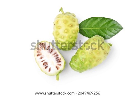 Flat lay (Top view) of Noni or Morinda Citrifolia fruits with sliced isolated on white background