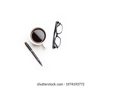 Flat lay, top view office table desk. Workspace with, laptop,office supplies, pencil, green leaf, and coffee cup on white background.