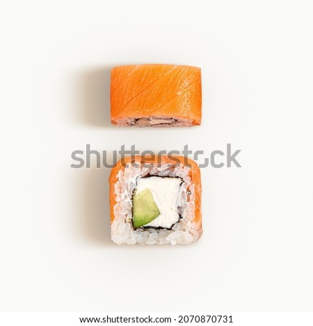 Image, Stock Photo Delicious sushi rolls on board with chopsticks