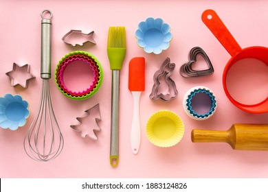 Flat Lay Of Various Baking Utensils On Pink Background, Top View