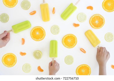 Flat Lay View Of Family Eating Ice Blocks Isolated On White Background. Summer Food Background And Texture