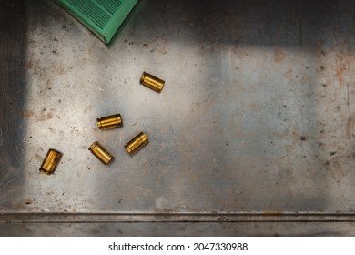 Flat lay view of lying fired bullet casings.