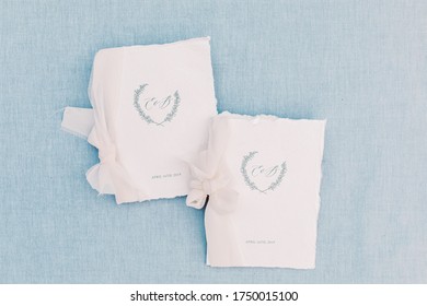 Flat Lay Of Wedding Invitations And Vow Books