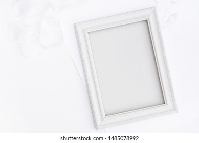 Flat lay white frame with copy space