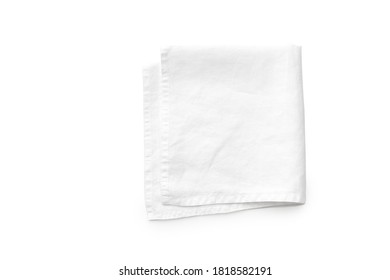 Flat Lay With White Linen Kitchen Napkin Isolated On White Background. Top View With Folded Cloth For Mockup