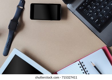 Flat lay of working desk with computer tablet and smart-phone, input text idea