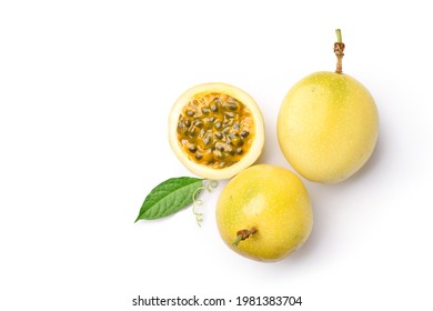 Flat Lay Of Yellow  Passion Fruit With Cut In Half And Green Leaf Isolated On White Background.
