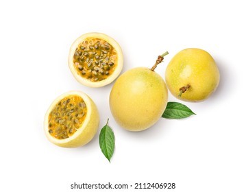 Flat lay of Yellow  passion fruit with cut in half and green leaf isolated on white background. - Shutterstock ID 2112406928