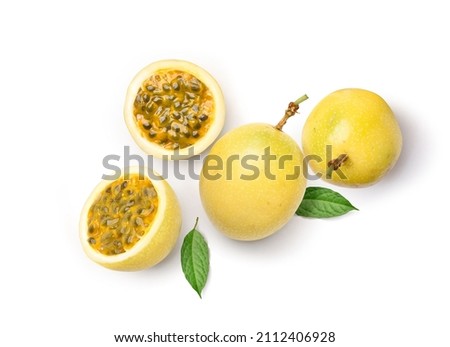 Flat lay of Yellow  passion fruit with cut in half and green leaf isolated on white background.

