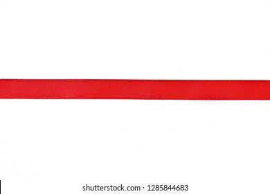 Flat Lay(Top View) Of Red Ribbon Isolated On White Background. Straight Line.