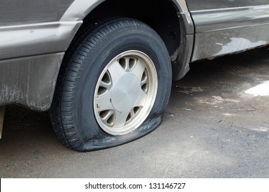 Flat Rear Tire On Car