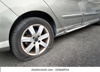 Flat Rear Tire On A Car