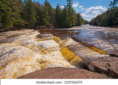 Flat Rock Cascade In The Spring Flood On The Presque Isle River In Porcupine Mountains State Park In Michigan