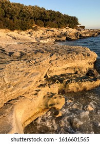 Flat Rocks Washed By The Sea At Punta Beach Under Late Winter Sun In January 2020. Duga Uvala, Istria, Croatia.