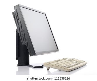 Flat Screen LCD Monitor With Old Classic Keyboard On White Background, Isolated Path Included