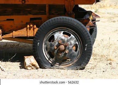 Flat Tire Stock Photo (Edit Now) 562632