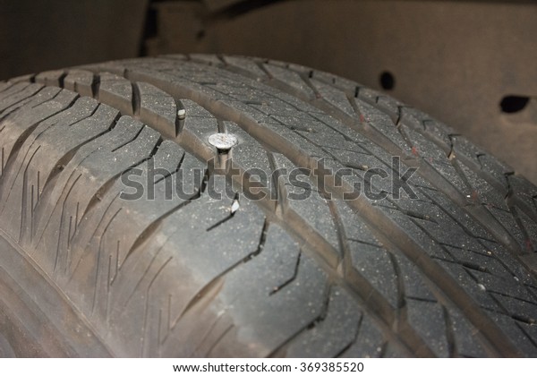 Flat tire because the\
screw prick tire.
