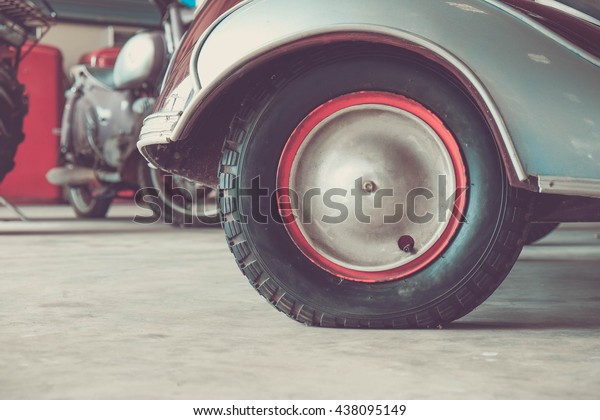 Flat tire car. Image is\
vintage effect