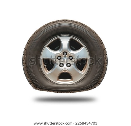Flat tire car wheel isolated on white background