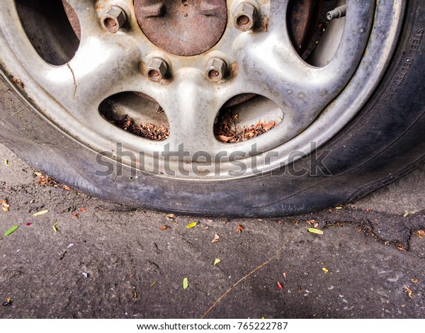 Flat tire, Old\
tire
