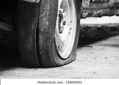 Flat tire of old car