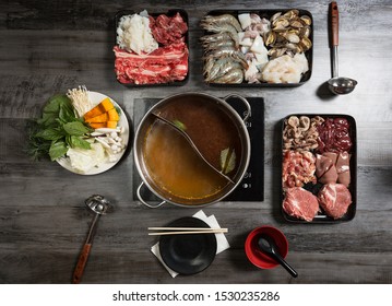 Flat Top View Of Shabu, Sukiyaki Boiling Pot, Overhead View Of Raw Ingredients With Cooking Broth, Thai Hot Pot, Family Dining Concept, Top View Of Fresh Ingredients With A Boiling Pot, Shabu Buffet.