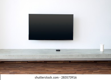 Flat TV Screen On White Wall