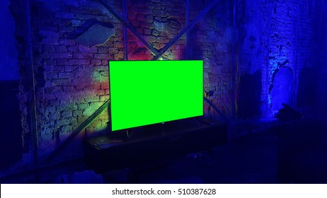 Flat Ultra Thin LED TV Screen In Nightclub From Side View - Green Masked