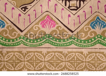 Flat view of batik patterns on soft fabric. Beautiful floral seamless pattern on fabric. fabric design and background.