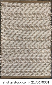 Flat weave woven natural area rug. - Shutterstock ID 2170670331