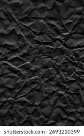 Flatbed scanner scan of crumpled matte black paper with deep creases, random folds and strong shadow variation, vertical format. Compared to the companion horizontal scan, the crumpling here is more dramatic with sharper, deeper fold lines creating stronger contrast between peaks and valleys. The matte black surface absorbs light unevenly across the folds, producing a wide tonal range from near-black in the deepest shadows to lighter gray on raised surfaces. No AI, no digital generation, no 3D rendering. 5000x7500px at 300dpi, print-ready. Works as background, overlay or displacement map for dark poster design, album covers, packaging, fashion editorial and product mockups. The deep crease pattern creates strong compositional movement and depth. Particularly effective as a displacement map in Photoshop for wrapping text or graphics onto a heavily crumpled surface.