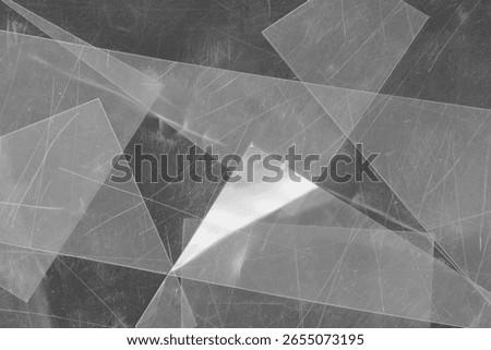 Flatbed scanner scan of overlapping translucent plastic sheets, creating a layered monochrome composition with soft gradients and fine surface scratches. The transparency of the material produces subtle tonal shifts where the sheets overlap, giving a depth and visual complexity not found in standard paper scans. No AI, no digital compositing. 7500x5000px at 300dpi, print-ready. Works in Multiply, Screen or Overlay blending mode for abstract backgrounds, editorial design, experimental poster layouts, album covers and art direction projects where a more graphic, less grainy analog quality is needed. The layered structure makes it particularly interesting as a base for double exposure style compositions.