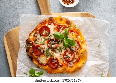 Flatbread Pepperoni Pizza Topped With Fresh Basil