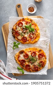 Flatbread Pepperoni Pizza Topped With Fresh Basil