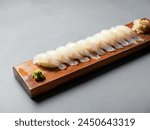 Flatfish sushi on a wooden tray