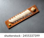 Flatfish sushi on a wooden tray