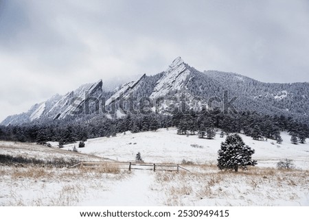 Flatirons Mountains In The Cold Winter